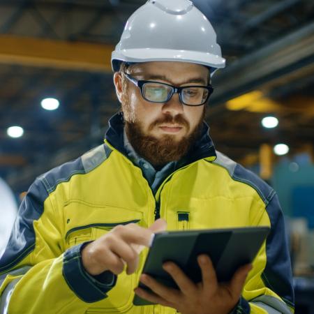 Industrial engineer holding a tablet